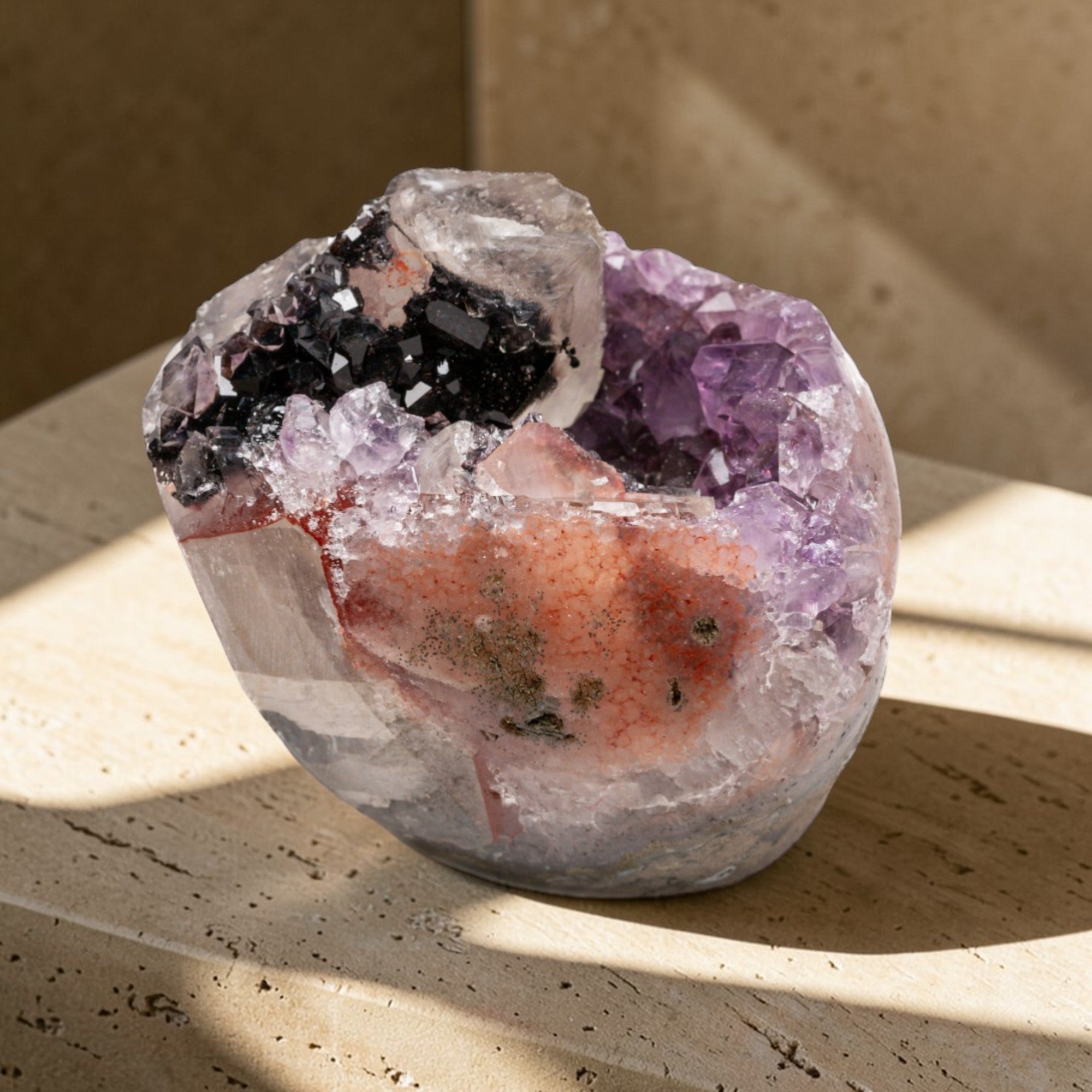 Dimensions: 3" H × 2.8" L × 2.5" W
Natural crystal from Uruguay. Certified. volcanic basalt geode. Red, purple and deep purple quartz. Amatista de colores.