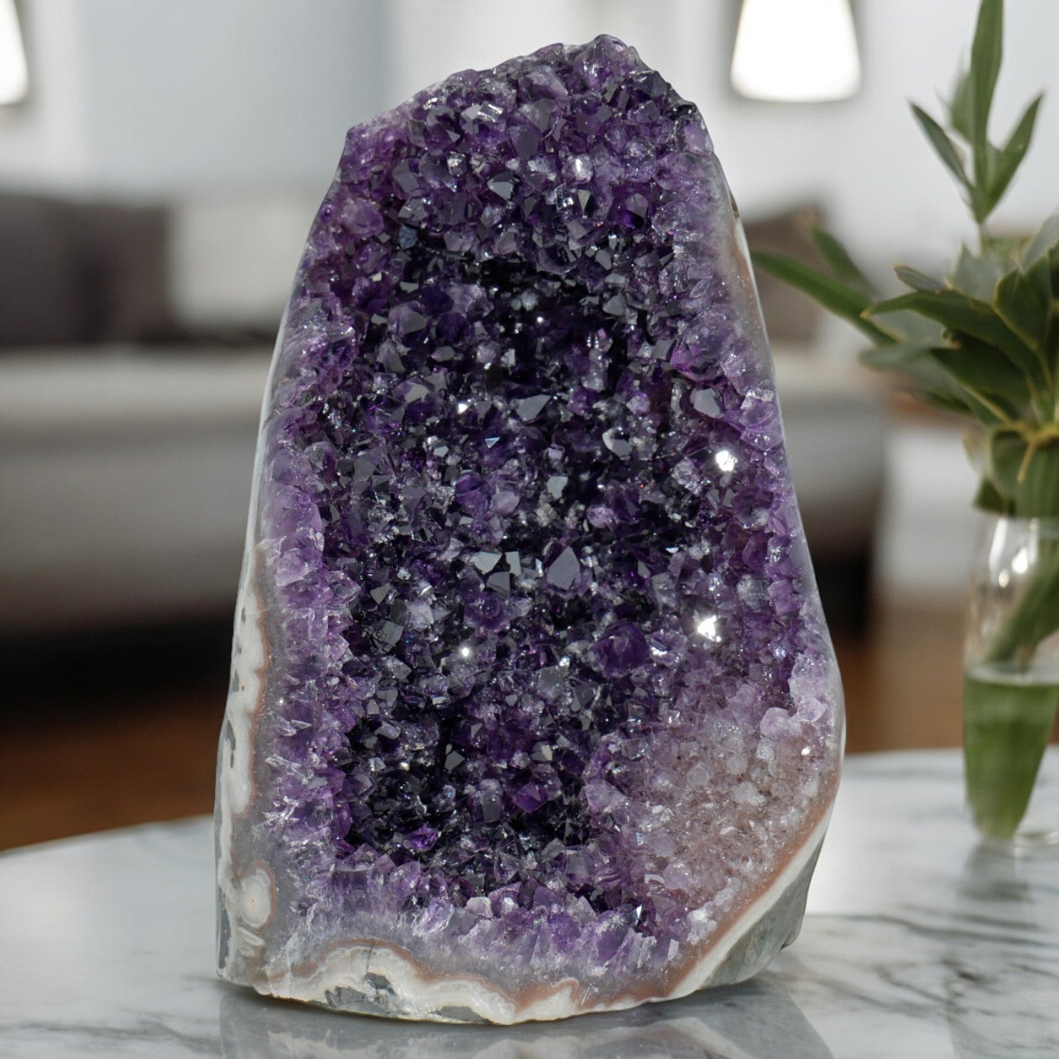 Upright amethyst geode from Uruguay featuring sparkling purple points and a bright quartz border along the edges