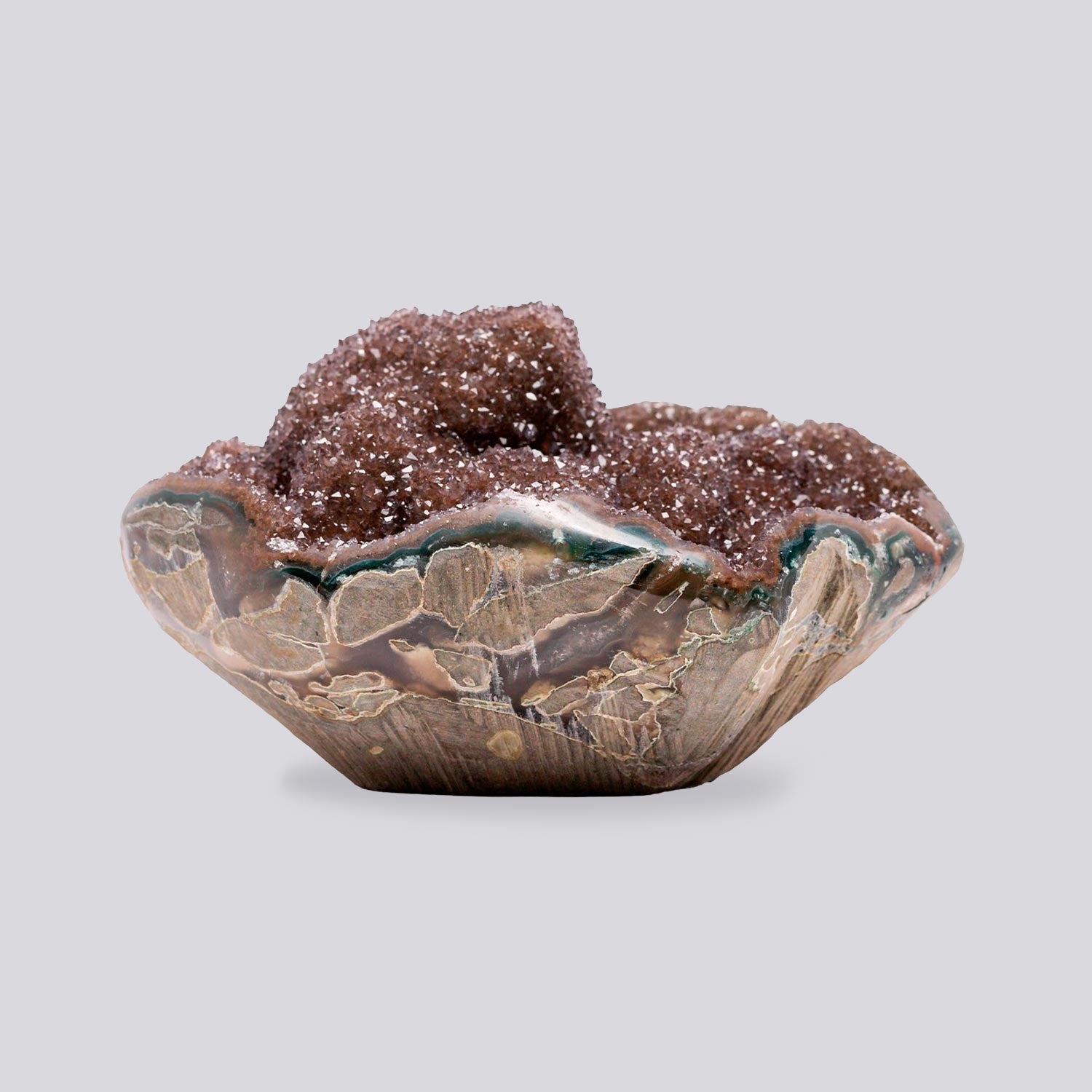 Mini druzy quartz geode with reddish brown crystal interior, strong banded agate layers, and visible chalcedony base, forming a sculptural hand-sized natural mineral specimen.