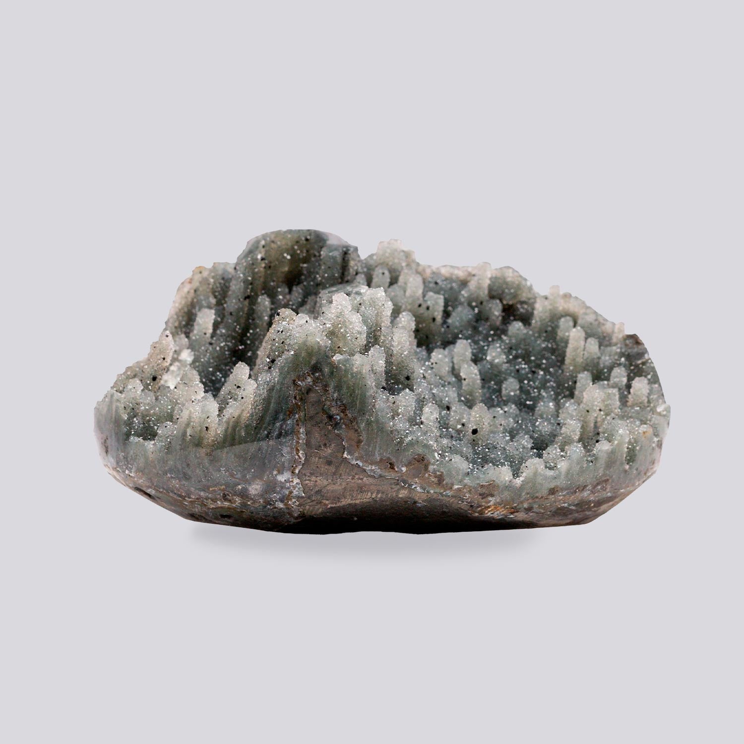 Mini druzy quartz geode with pale grey crystal points rising from a chalcedony base, featuring a sparkling druzy quartz interior and natural volcanic layering in a sculptural, hand-sized formation.