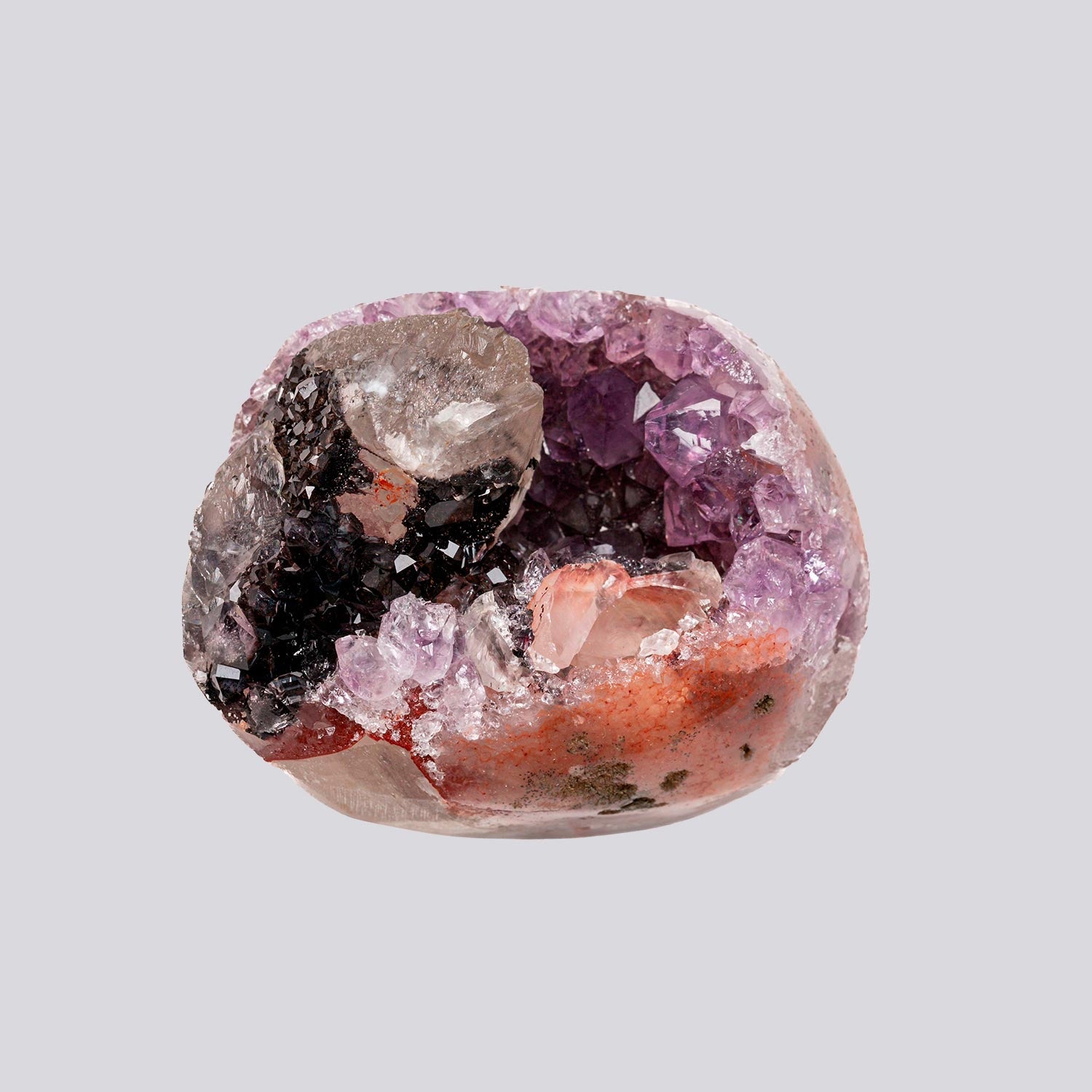 Polished natural amethyst geode with volcanic basalt formation origins
Vivid purple amethyst crystal druzy interior with quartz crystal geode structure