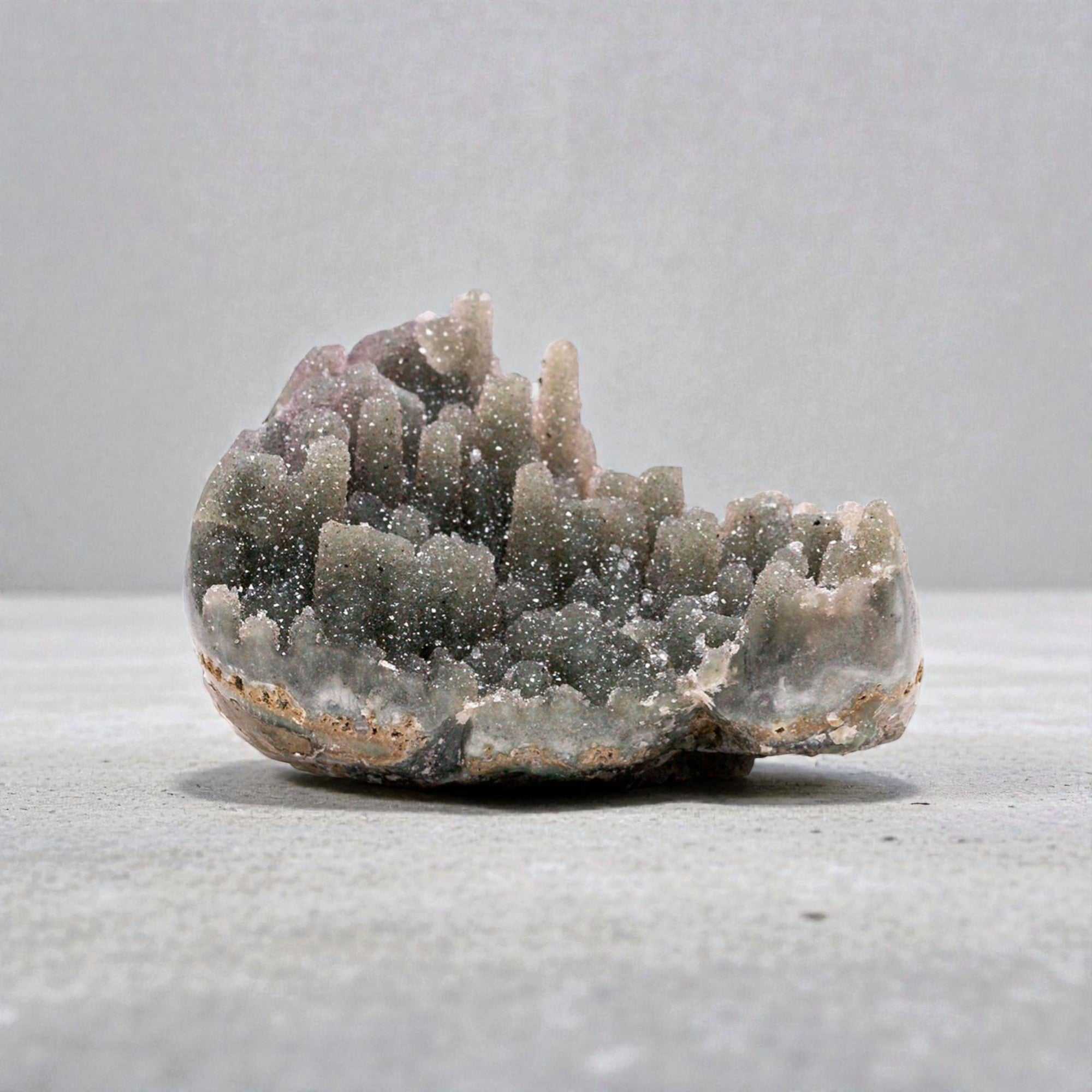 Grey and rose banded agate edge
natural crystal cavity